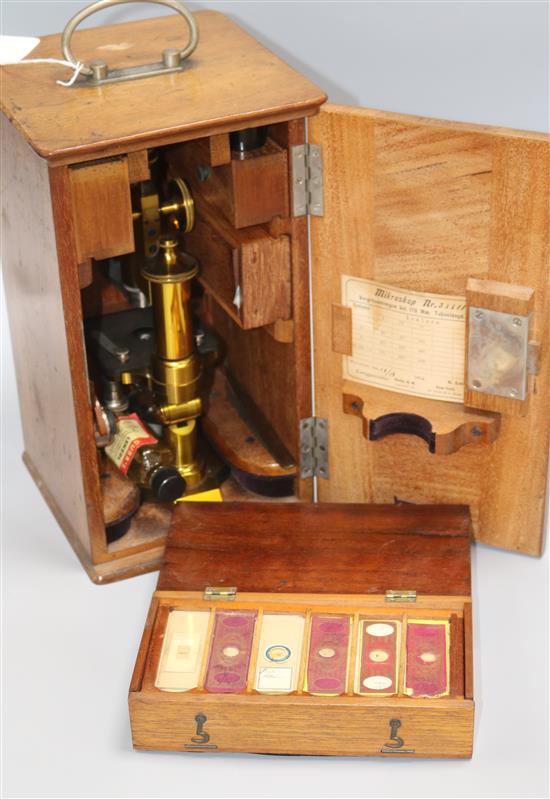 A Leitz Wetzler brass monocular microscope, objectives, case & slides width 18cm height 33cm